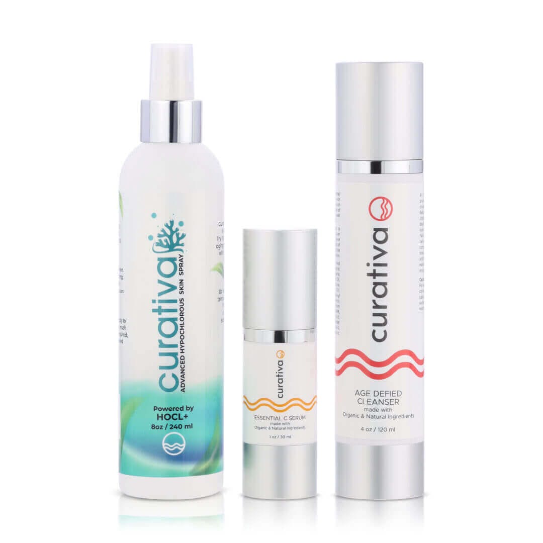 Curativa skincare products: HOCl spray, Essential C Serum, Age Defied Cleanser with organic ingredients.