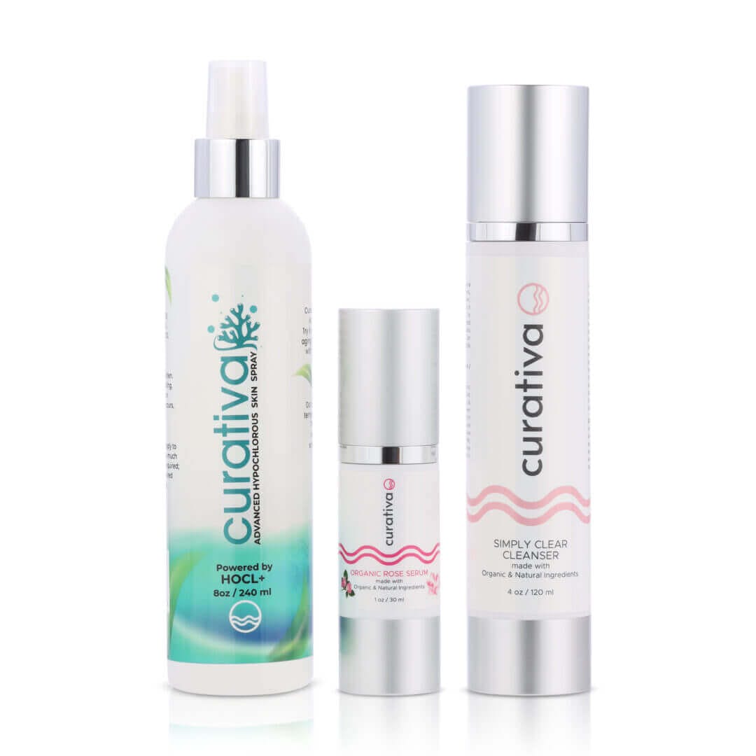 Curativa Simply Clear Regimen: Hypochlorous Skin Spray, Organic Rose Serum, and Simply Clear Cleanser for radiant skin.