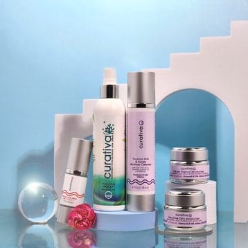 Luxurious skincare products from Diamond and Silk Regimen, featuring creams and serums on a modern blue backdrop.