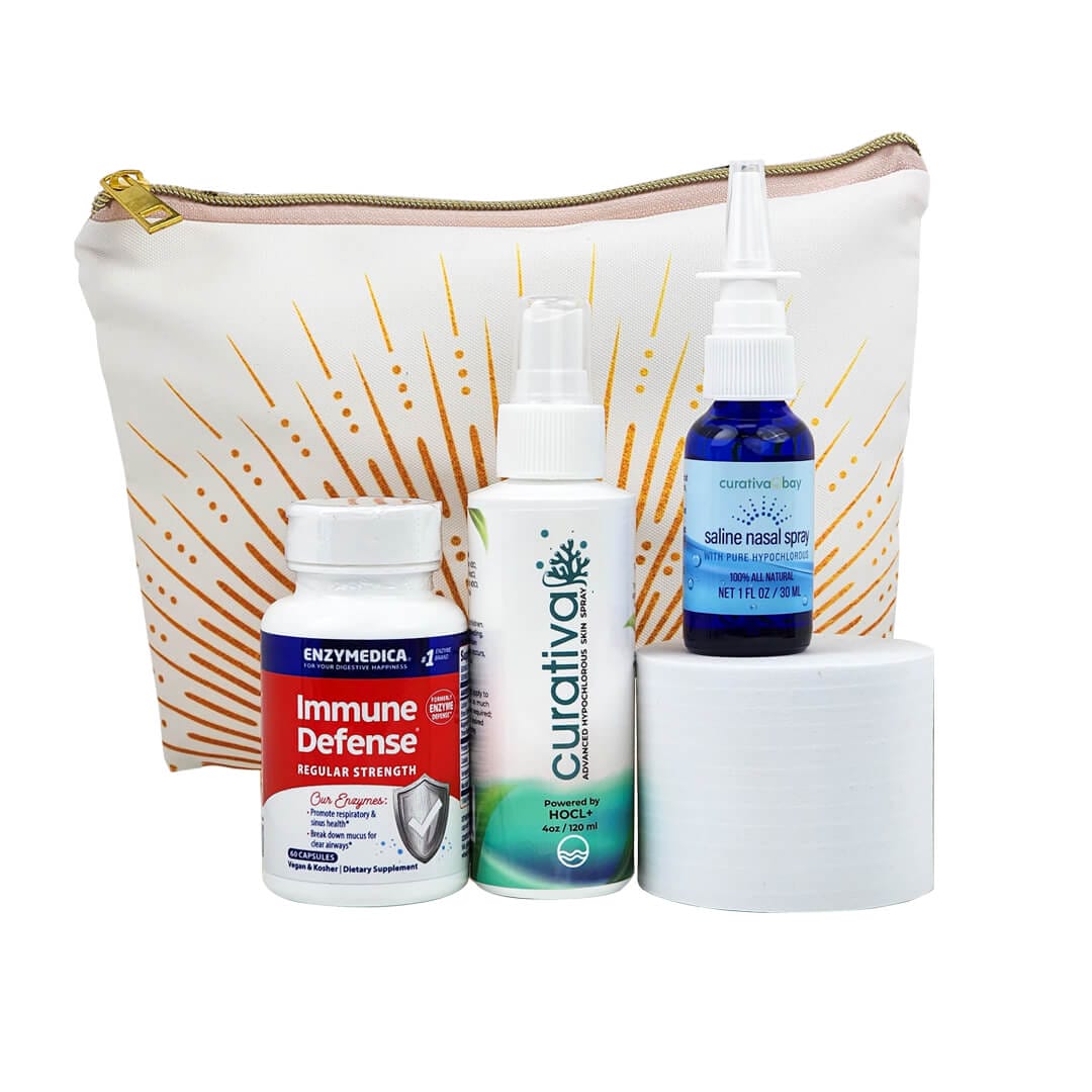 COVID-19 care bundle with immune defense, nasal spray, disinfectant, tissues, and decorative pouch.